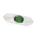 PIAGET, A GREEN SAPPHIRE AND DIAMOND RING, 1998 set with a cushion cut green sapphire, accented by a