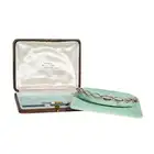 AN ANTIQUE DIAMOND TIARA / BRACELET, EARLY 20TH CENTURY in platinum and 18ct yellow gold, comprising