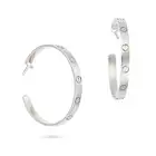 CARTIER, A PAIR OF LOVE HOOP EARRINGS in 18ct white gold, each hoop punctuated by screw head motifs,