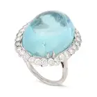 A LARGE AQUAMARINE AND DIAMOND DRESS RING set with an oval cabochon aquamarine of approximately 29.