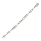 A FINE ART DECO DIAMOND BRACELET comprising a series of geometric links set throughout with old
