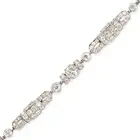 A FINE ART DECO DIAMOND BRACELET comprising a series of geometric links set throughout with old