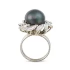 GRIMA, A VINTAGE NATURAL SALTWATER PEARL AND DIAMOND DRESS RING in platinum, set with a black