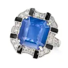 A CEYLON SAPPHIRE, DIAMOND AND ENAMEL RING set with an octagonal step cut sapphire of 6.86 carats,