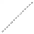 A DIAMOND BRACELET comprising a row of links set with cushion cut diamonds in borders of round