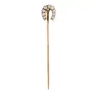 TIFFANY & CO., AN ANTIQUE DIAMOND HORSESHOE STICK / TIE PIN, EARLY 20TH CENTURY designed as a