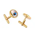 LOT WITHDRAWN THEO FENNELL, A PAIR OF ESSEX CRYSTAL GOLF CUFFLINKS in 18ct yellow gold, each set