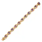 NO RESERVE - A MODERNIST AMETHYST BRACELET, 1975 in 9ct yellow gold, comprising a row of textured
