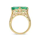 A 6.39 CARAT COLOMBIAN EMERALD RING set with an octagonal step cut emerald of 6.39 carats, the