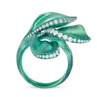 ALEXIS NY, A TITANIUM AND DIAMOND FLOWER RING designed as a flower accented by rows of round