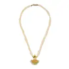 AN INDIAN PEARL PENDANT NECKLACE the pendant comprising gold beads, accented by a fringe of pearls