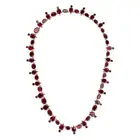 AN ANTIQUE GARNET RIVIERE NECKLACE, 19TH CENTURY comprising a row of alternating foiled pear and