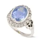 NO RESERVE - A SAPPHIRE AND DIAMOND RING set with a cushion cut sapphire of approximately 4.60