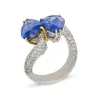 AN ITALIAN SAPPHIRE AND DIAMOND TOI ET MOI RING set with two pear cut sapphires of approximately 3.