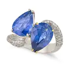 AN ITALIAN SAPPHIRE AND DIAMOND TOI ET MOI RING set with two pear cut sapphires of approximately 3.