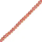 A PEACH SAPPHIRE LINE BRACELET comprising a row of oval cut peach sapphires totalling 17.5-18.0