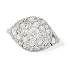 A DIAMOND CLUSTER RING set with a cluster of old and rose cut diamonds, the shoulders set with