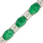 A CHINESE CARVED JADEITE JADE AND DIAMOND BRACELET set with five Chinese carved jadeite jade