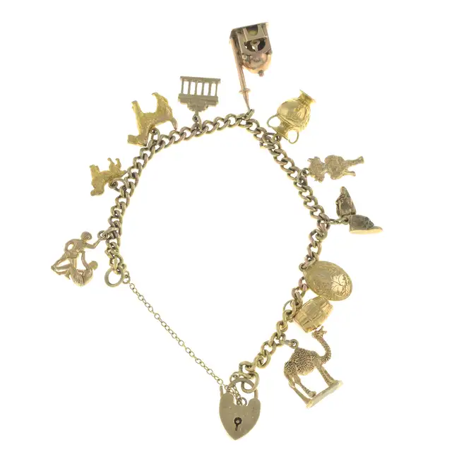 Mid 20th 9ct gold charm bracelet, with charms