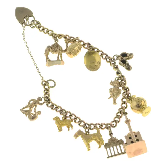Mid 20th 9ct gold charm bracelet, with charms