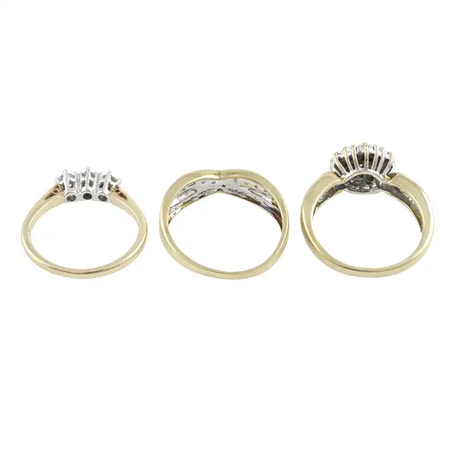 Three 9ct gold diamond rings
