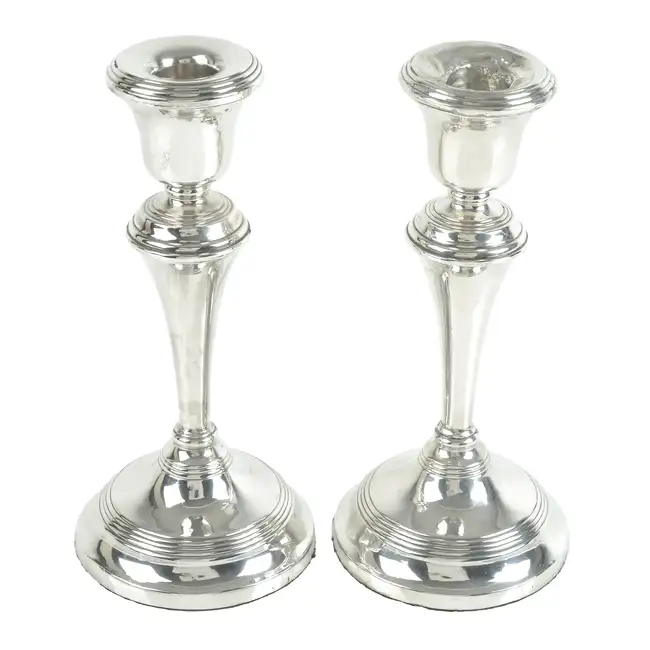 Pair of 1930's silver candlesticks (filled) 