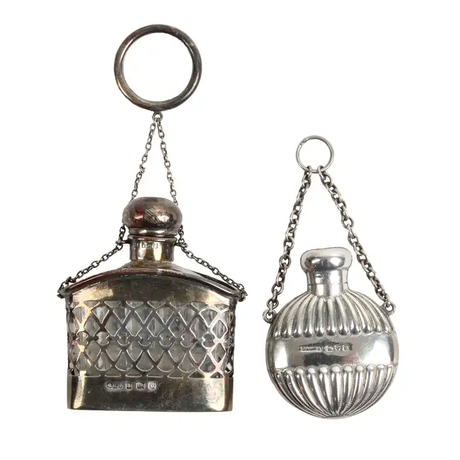 Two silver scent bottles