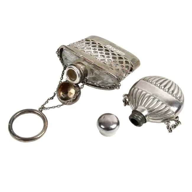 Two silver scent bottles
