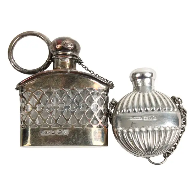 Two silver scent bottles