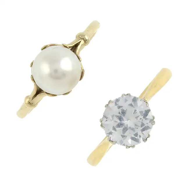 Two gem-set rings