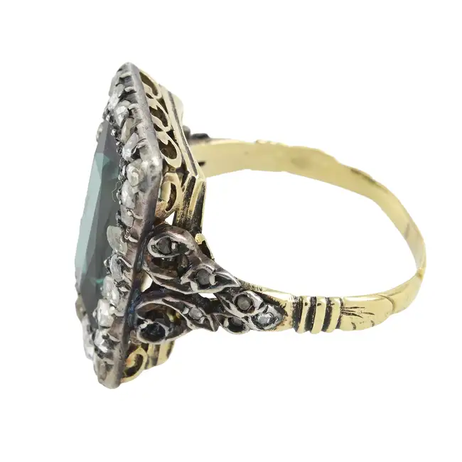 Green tourmaline and diamond point ring