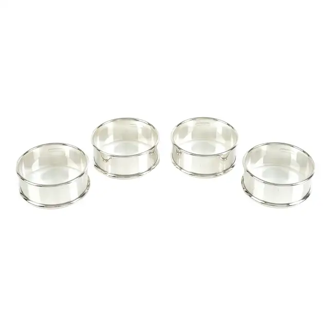 Set of four contemporary silver napkin rings 