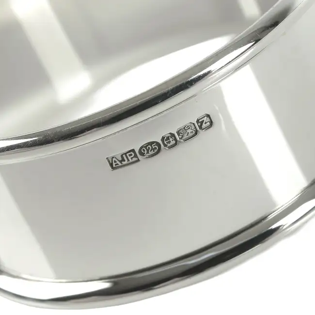Set of four contemporary silver napkin rings 