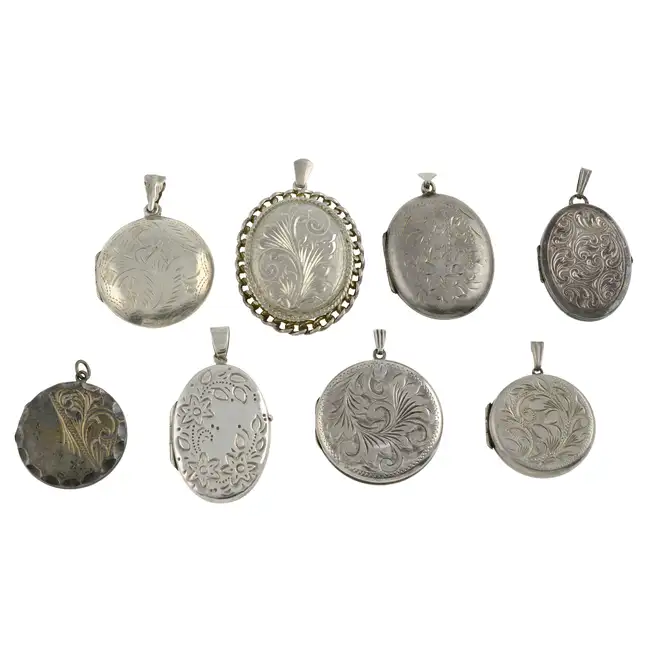 Eight locket pendants