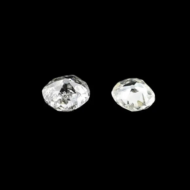 Two old-cut diamonds, 1.05ct