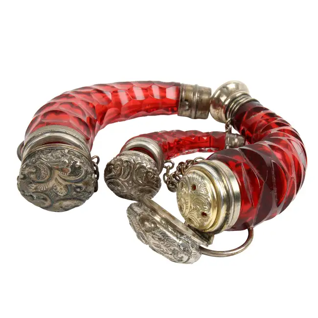 Three ruby glass horn or cornucopia scent bottles