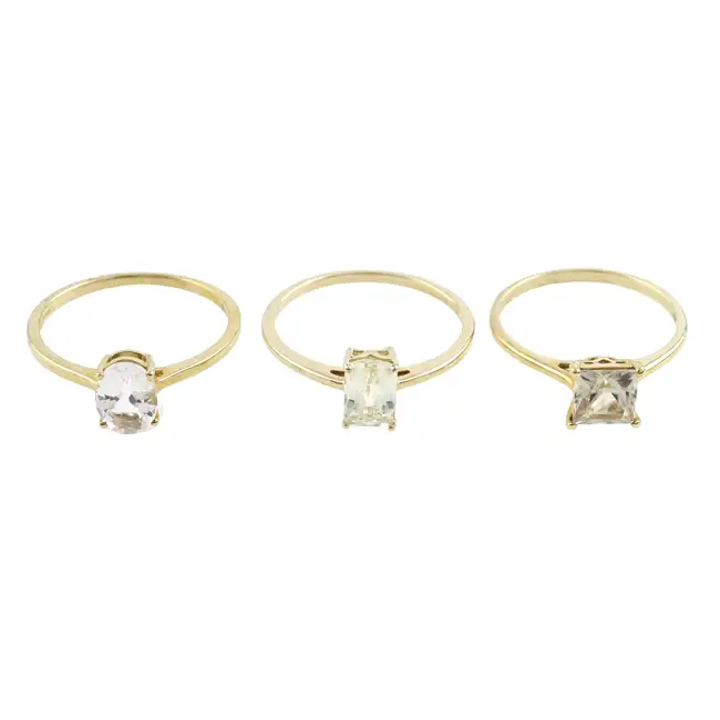 Three 9ct gold gem single-stone rings