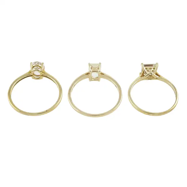 Three 9ct gold gem single-stone rings