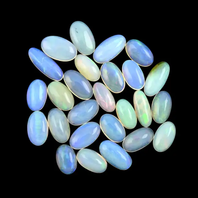 Assorted oval-shape opal cabochons, 50.65ct