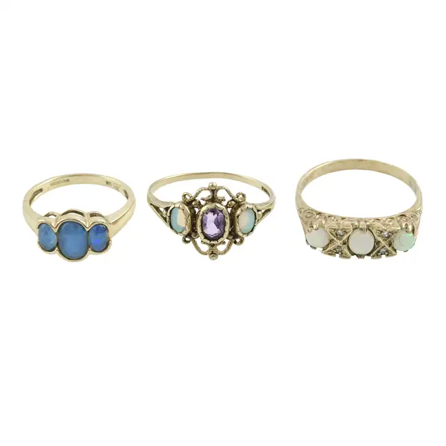 Three 9ct gold gem-set rings