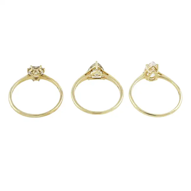 Three 9ct gold gem-set rings