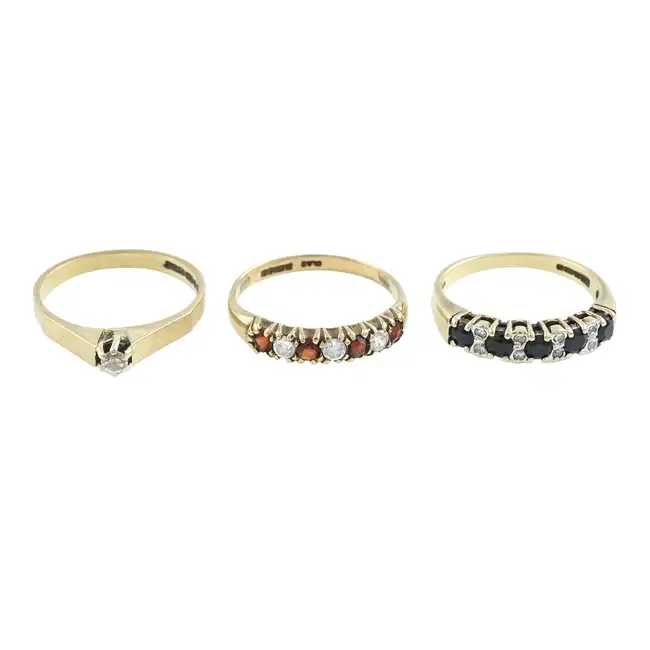 Three 9ct gold gem-set rings