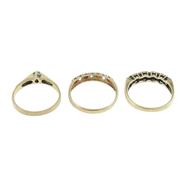 Three 9ct gold gem-set rings