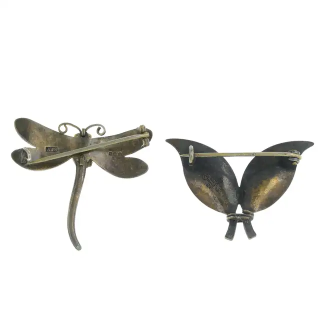 Two 20th century enamel brooches