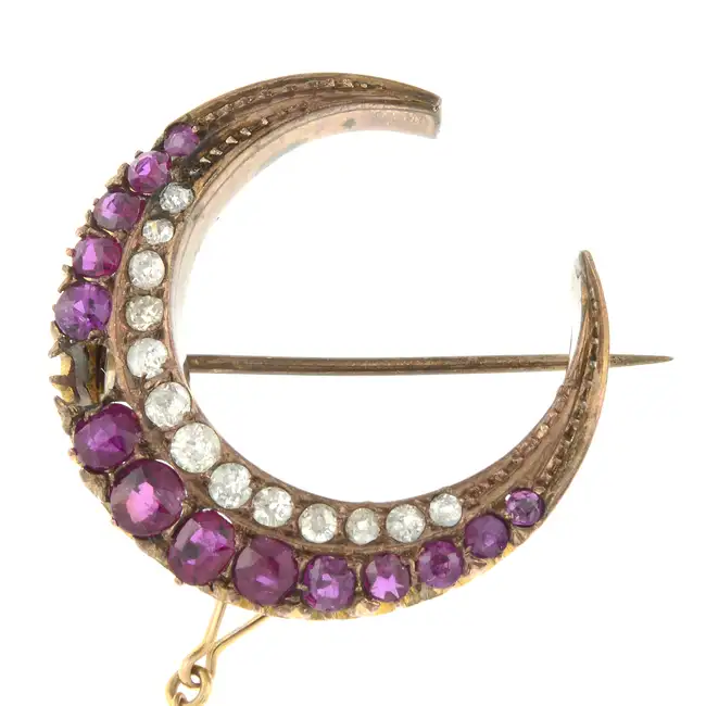 Late 19th century ruby & diamond crescent brooch