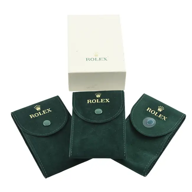 Rolex - three service pouches.