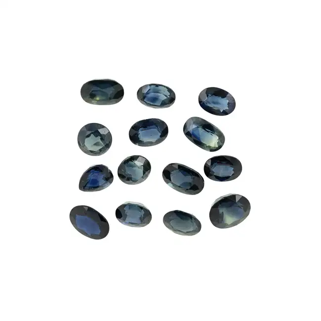 Fourteen vari-shape green sapphires, 18.58ct