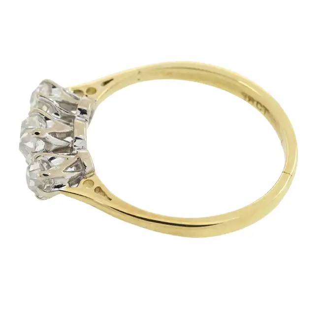 Graduated old-cut diamond three-stone ring