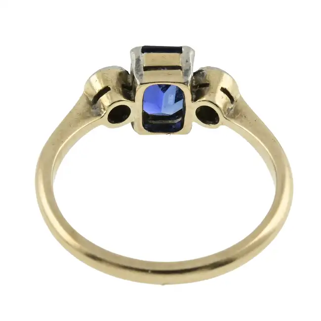 Synthetic sapphire & diamond three-stone ring