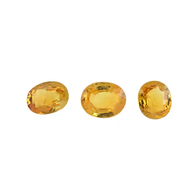 Three oval-shape orange sapphires, 5.13ct